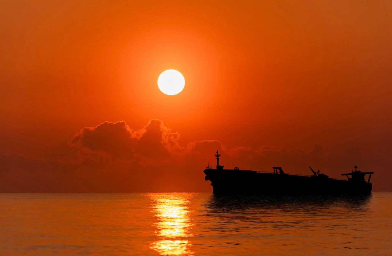 Sunset over port operations at Karachi